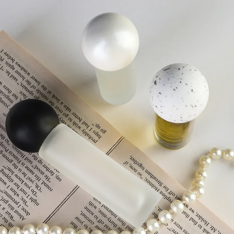 15 / 20 ml Clear or frosted cylindrical perfume bottle with ball cap