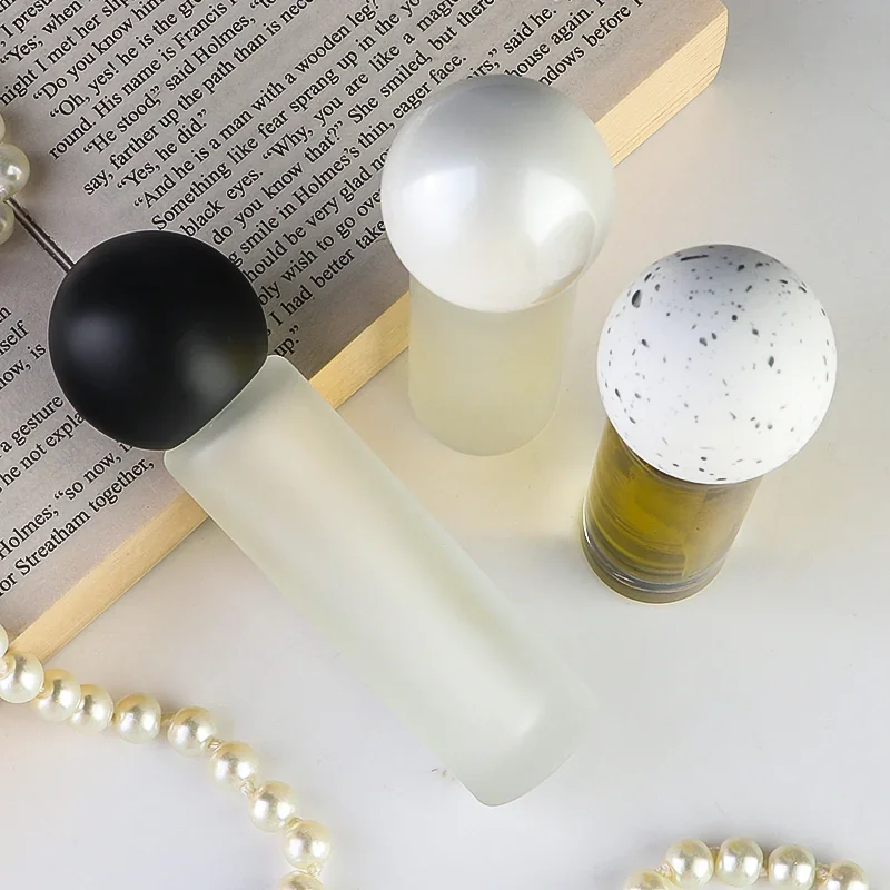 15 / 20 ml Clear or frosted cylindrical perfume bottle with ball cap