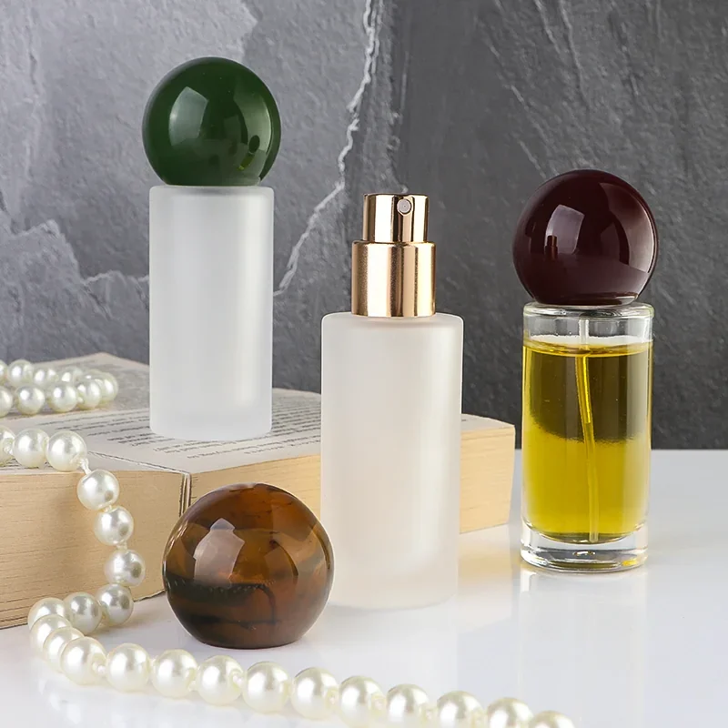 20 ml Clear or frosted cylindrical perfume bottle with ball cap