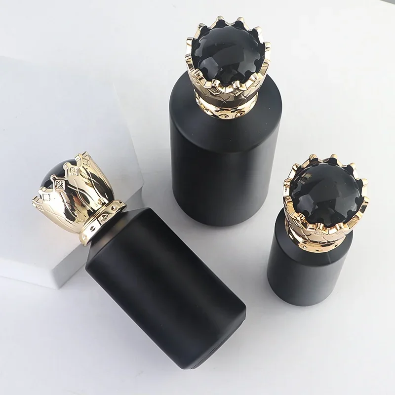 30 / 50 / 100 ml Cylindrical perfume bottle with crown-style cap