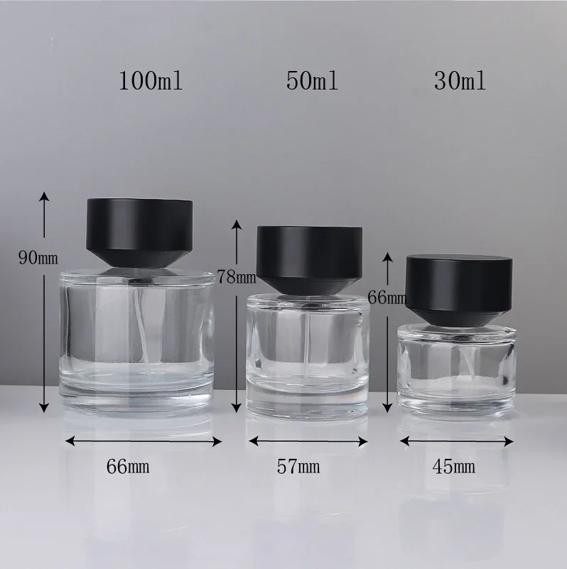 30 / 50 / 100 ml Round perfume bottle with flared black cap