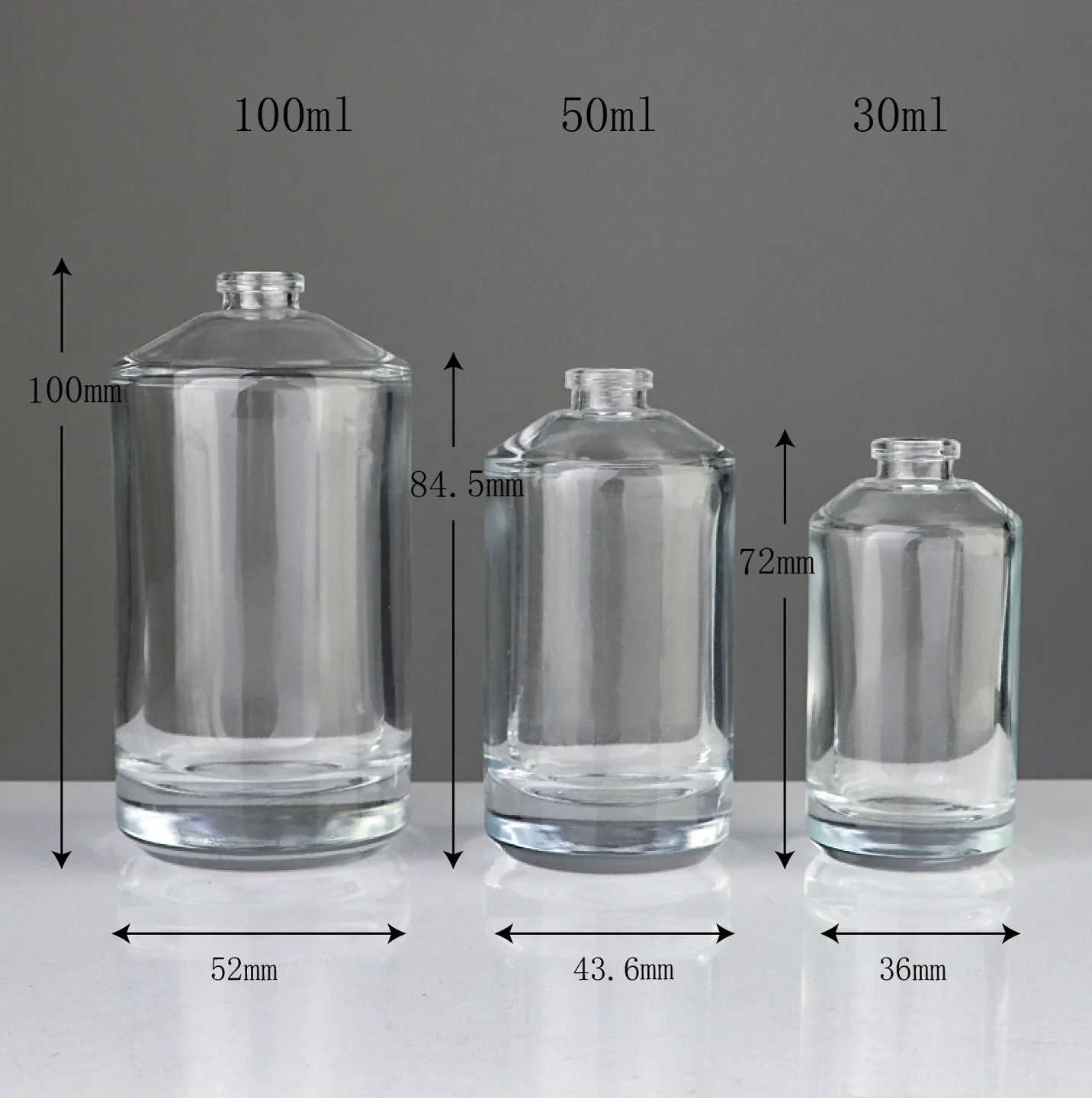 30 / 50 / 100 ml Cylindrical perfume bottle with crown-style cap
