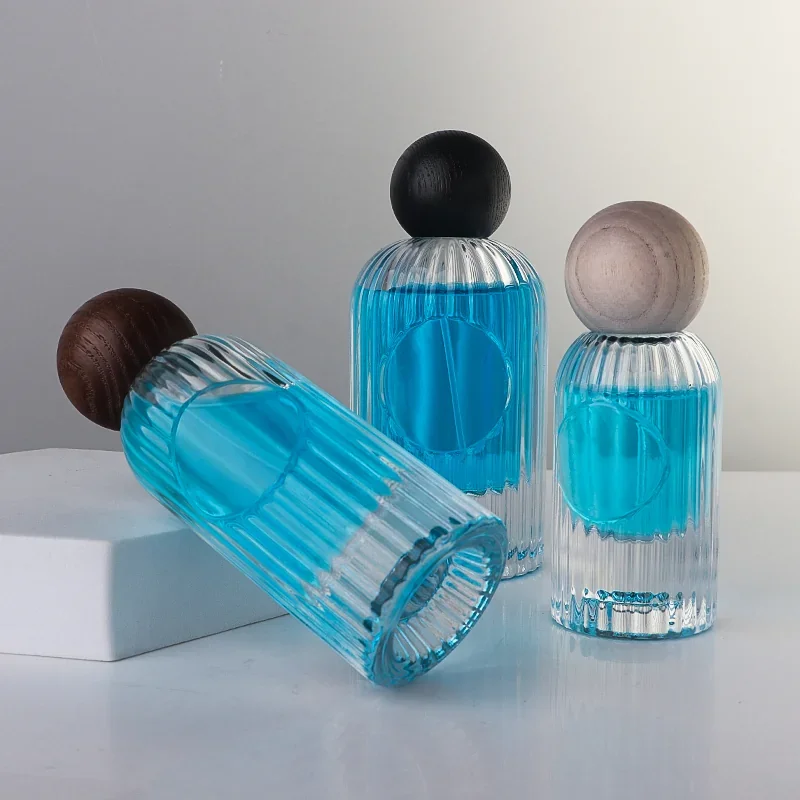 30 / 50 / 100 ml Fluted cylindrical perfume bottle with ball cap