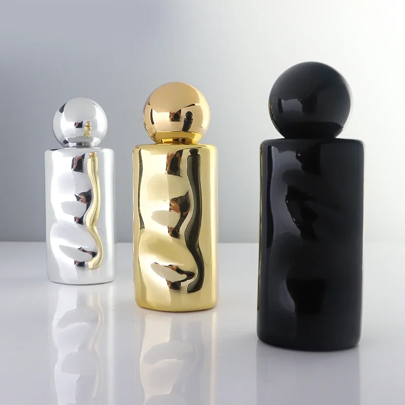 30 / 50 ml Sculpted perfume bottle with mirror-look finish
